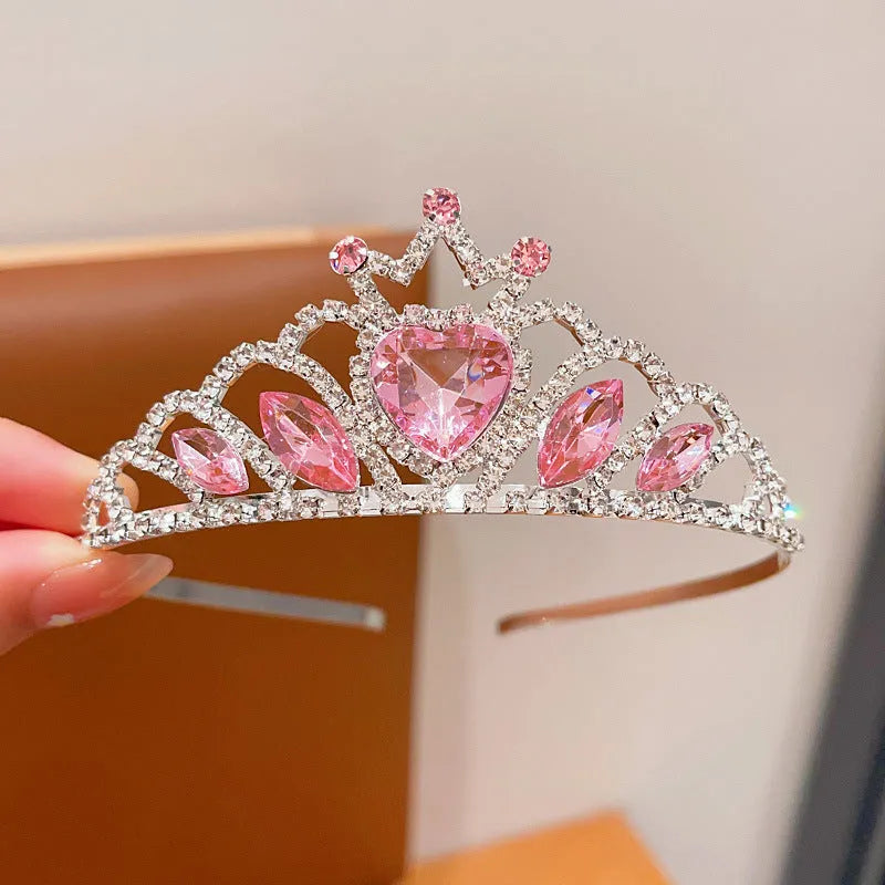 Children's pink crystal crown metal headband hair accessory for princess dress-up.
