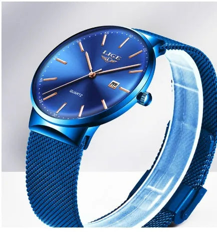 Men's stainless steel watch with 40mm dial on a strap, shown in black, blue, and two-tone colour variations.