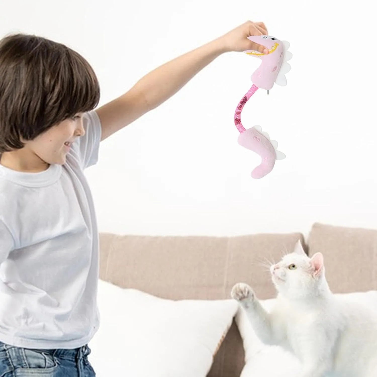 Set of four cat toys including plush chew toys, catnip rope, springs, and kicker toy on floor