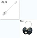White window security chain lock with steel cable and adhesive base on a window frame