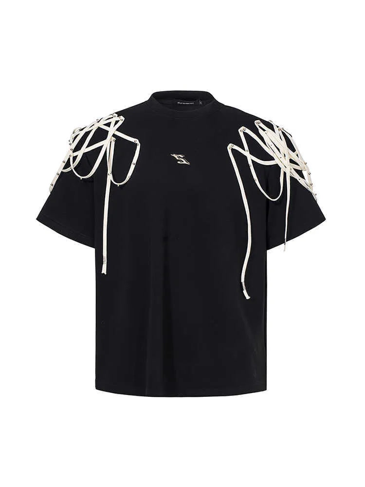 Black loose-fit short-sleeved t-shirt showing padded shoulder detail with rivet ribbon.