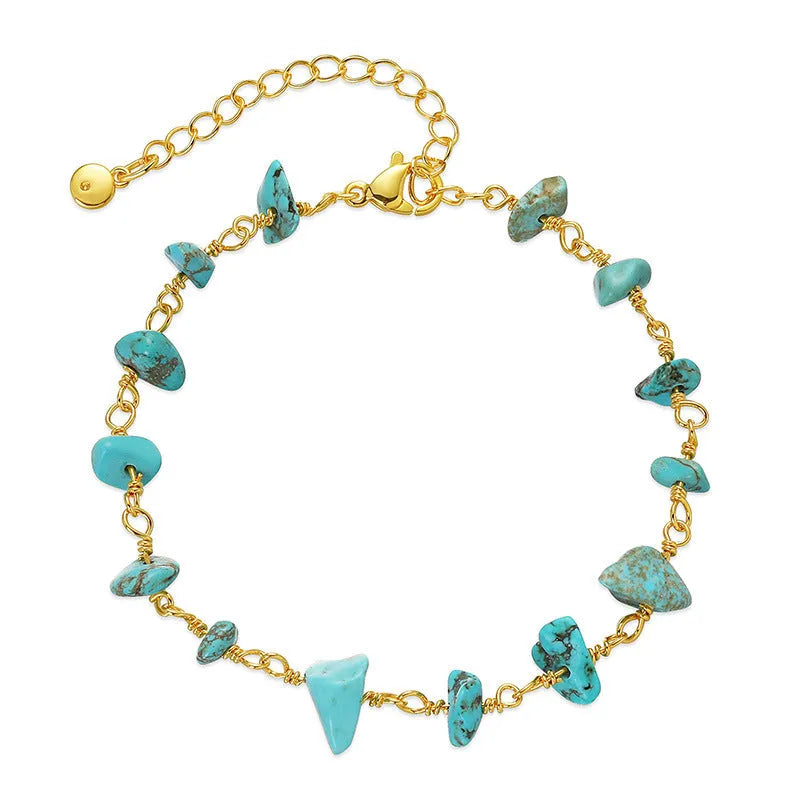 Irregular geometric gravel bracelet with crystal accents in 18K gold plated copper, showing blue colour option