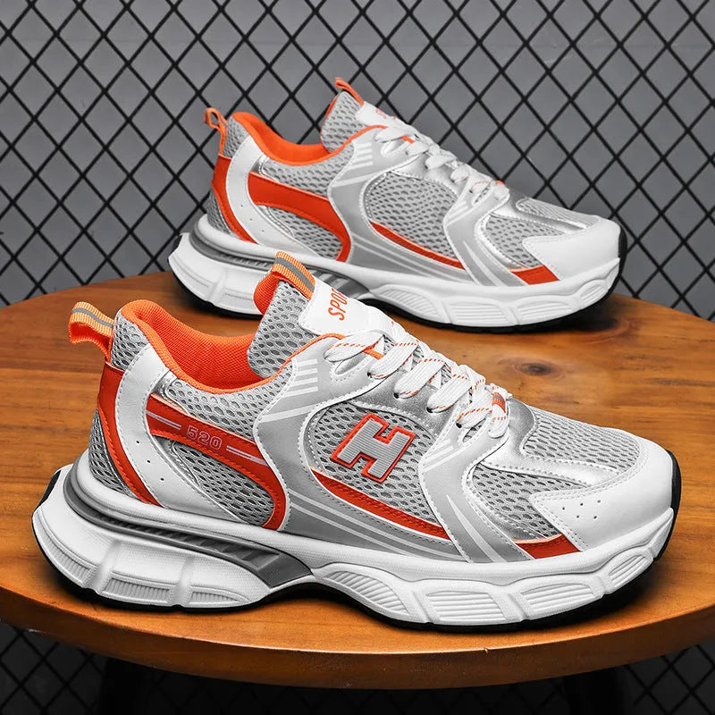 Men's mesh running shoes with plastic sole in black, white and grey, and white orange colour options