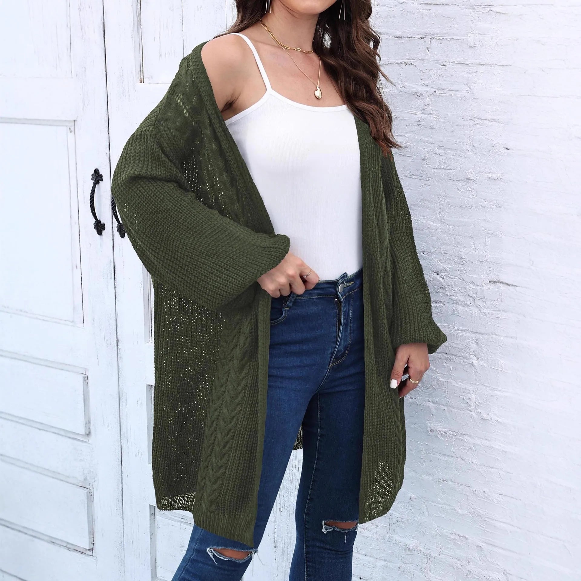 Women's loose fit acrylic sweater coat cardigan in a solid colour, shown in free size.