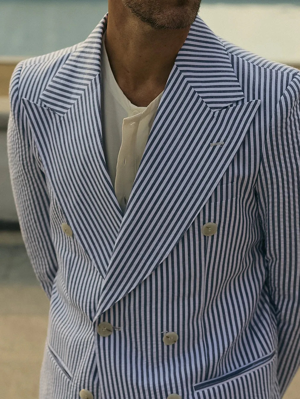 Blue and white striped two-piece polyester suit set with regular fit blazer and trousers