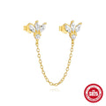 Golden geometric sterling silver stud earrings with zircon inlay, showing clover, crown, chain, and double piercing designs.