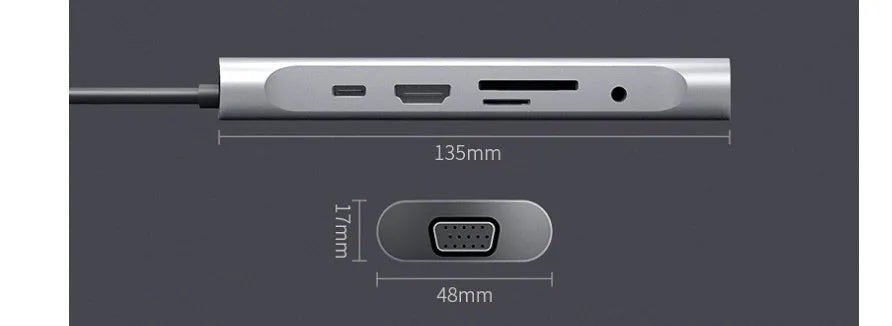 Grey aluminium USB-C docking station showing HDMI, VGA, USB 3.0, and USB-C PD charging ports.