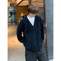 Men's loose fit V-neck cotton blend cardigan in Army Green, shown on a model.