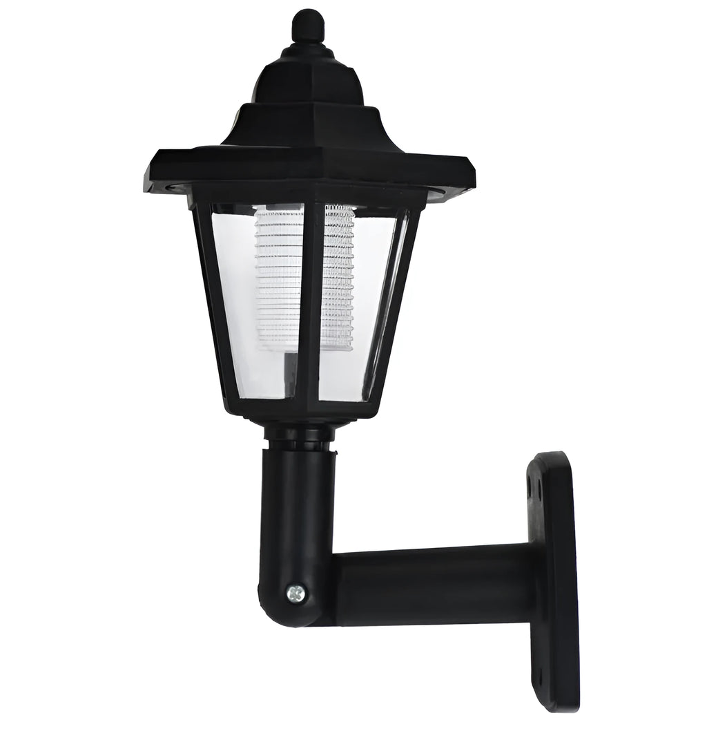 Black hexagonal solar wall light for outdoor mounting with automatic light sensor