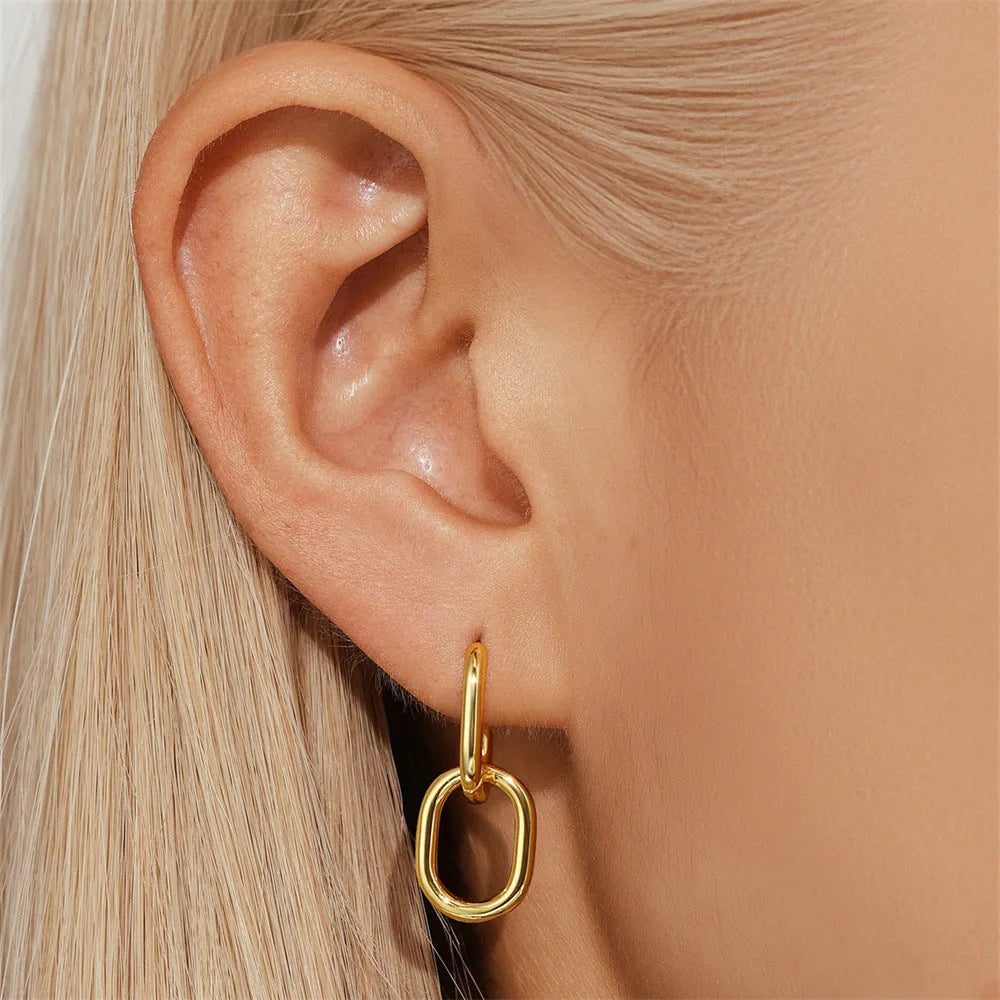 Gold electroplated brass diamond earclip earrings with geometric round design on copper base