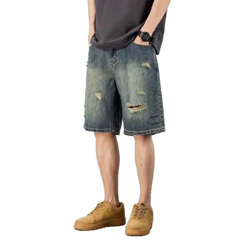 Men's blue denim shorts with retro loose hole design and straight cut