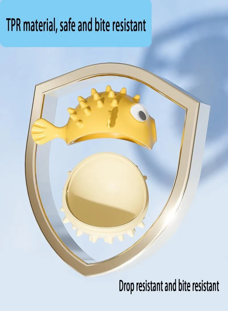 Green fish-shaped interactive dog toy with treat dispensing slots and raised cleaning texture