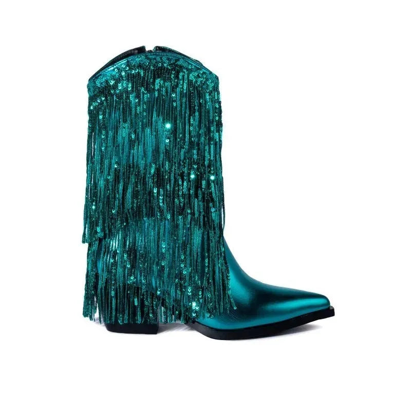 Women's black chunky heel tassel boots with pointed toe and high stiletto heel on a plain background.
