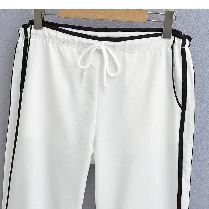 Women's navy blue trousers with white contrast ribbon parallel bar detailing, low-waist straight-leg design