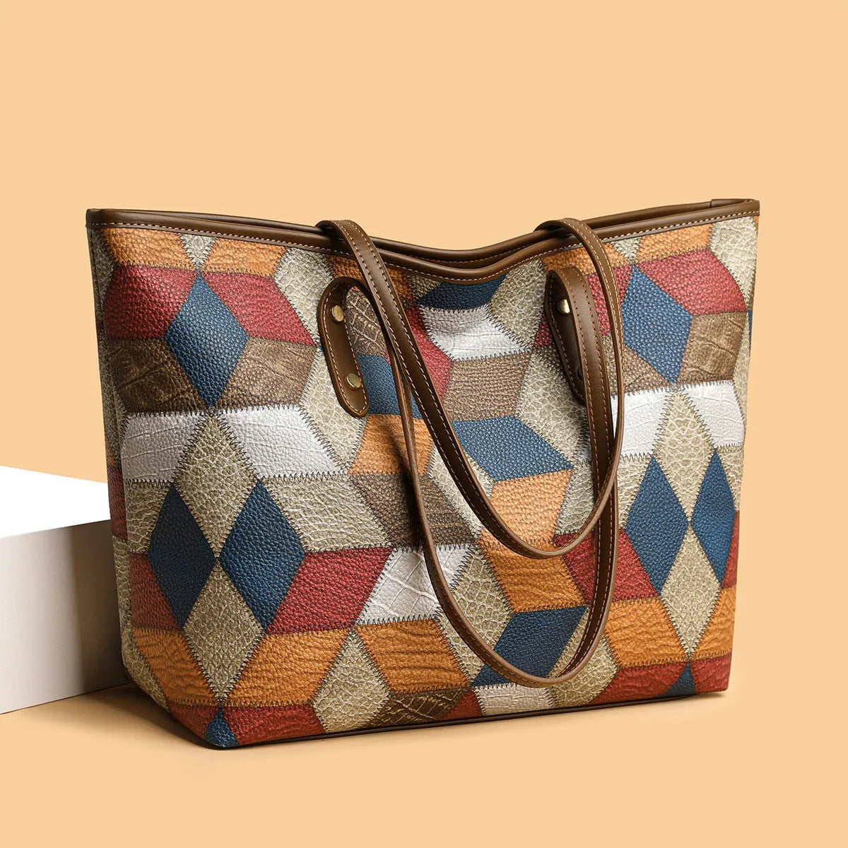 Women's PVC shoulder handbag with sandwich pockets in blue brown colour option