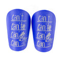 Football training shin guard in Pu material, colour black, size S, placed on grass