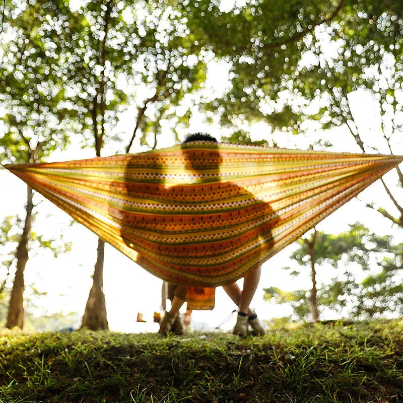 Bohemian yellow parachute cloth hammock measuring 260x140cm with 200kg capacity for outdoor park use