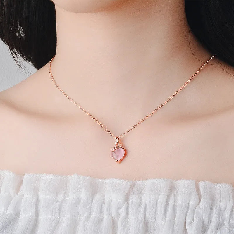 Rose gold heart necklace with pink artificial crystal pendant on cross chain