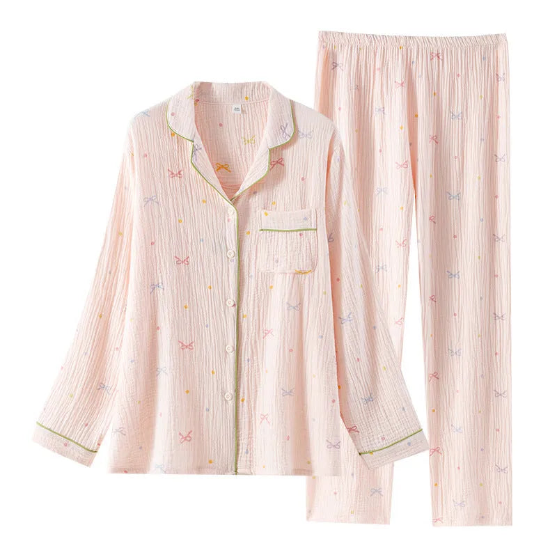 Women's thin cotton long-sleeve pajama set in pink, showing top and trousers.