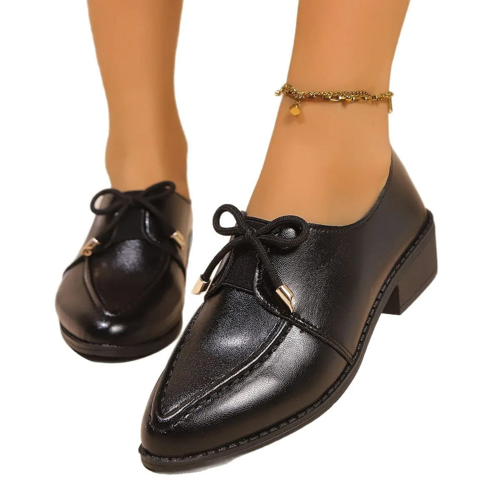 Women's British-style leather shoes with decorative bow details and rubber sole
