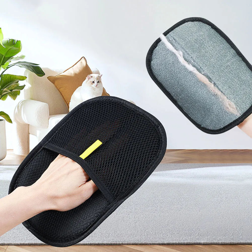 Black pet hair removal glove with silicone bristles for grooming dogs, cats, and rabbits.