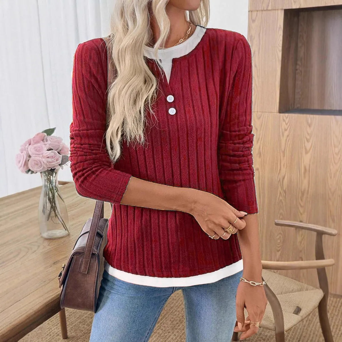 Women's black fake two-piece button pullover sweater with concave stripe texture and long sleeves