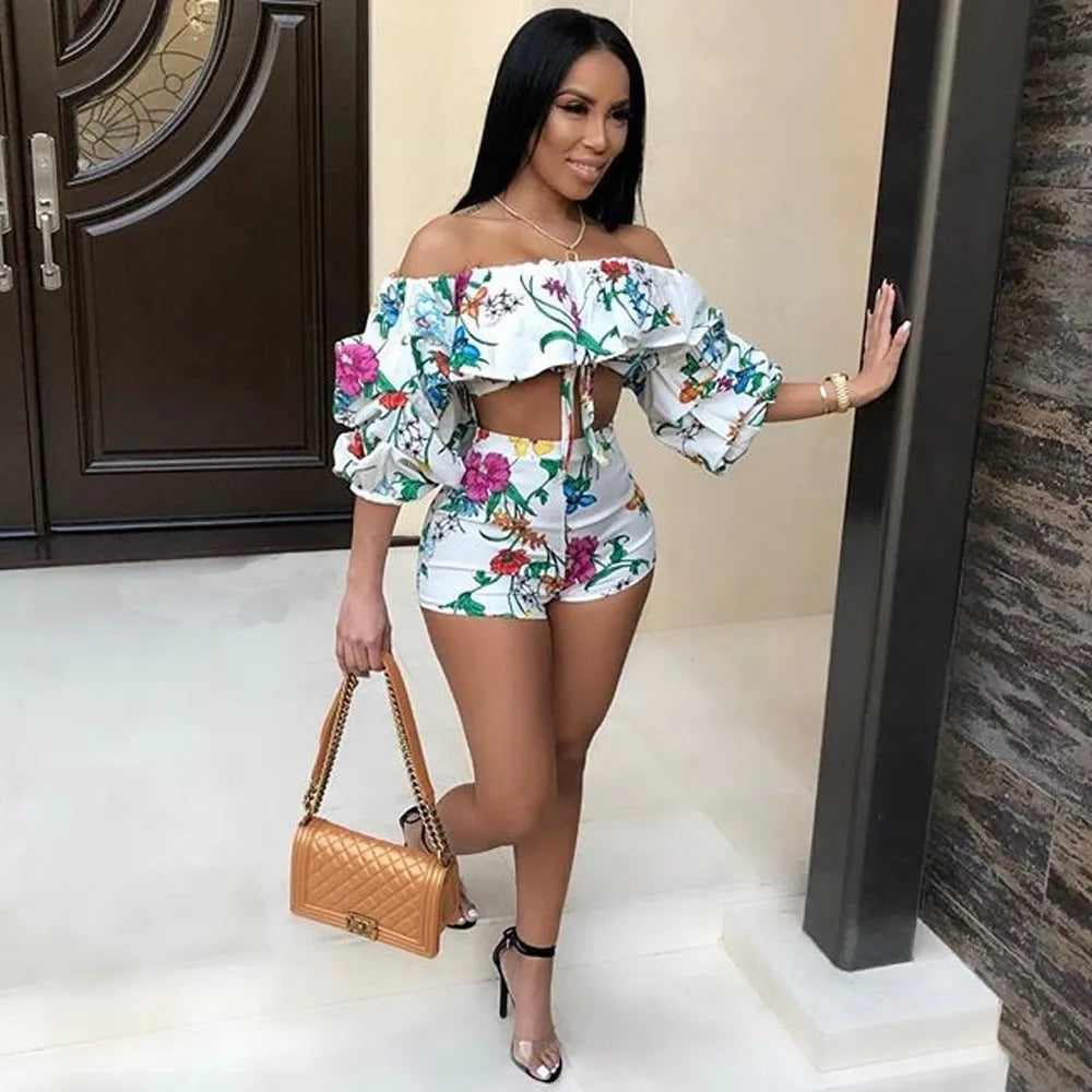 Multicolour digital print two-piece costume with fluffy sleeves and matching shorts.