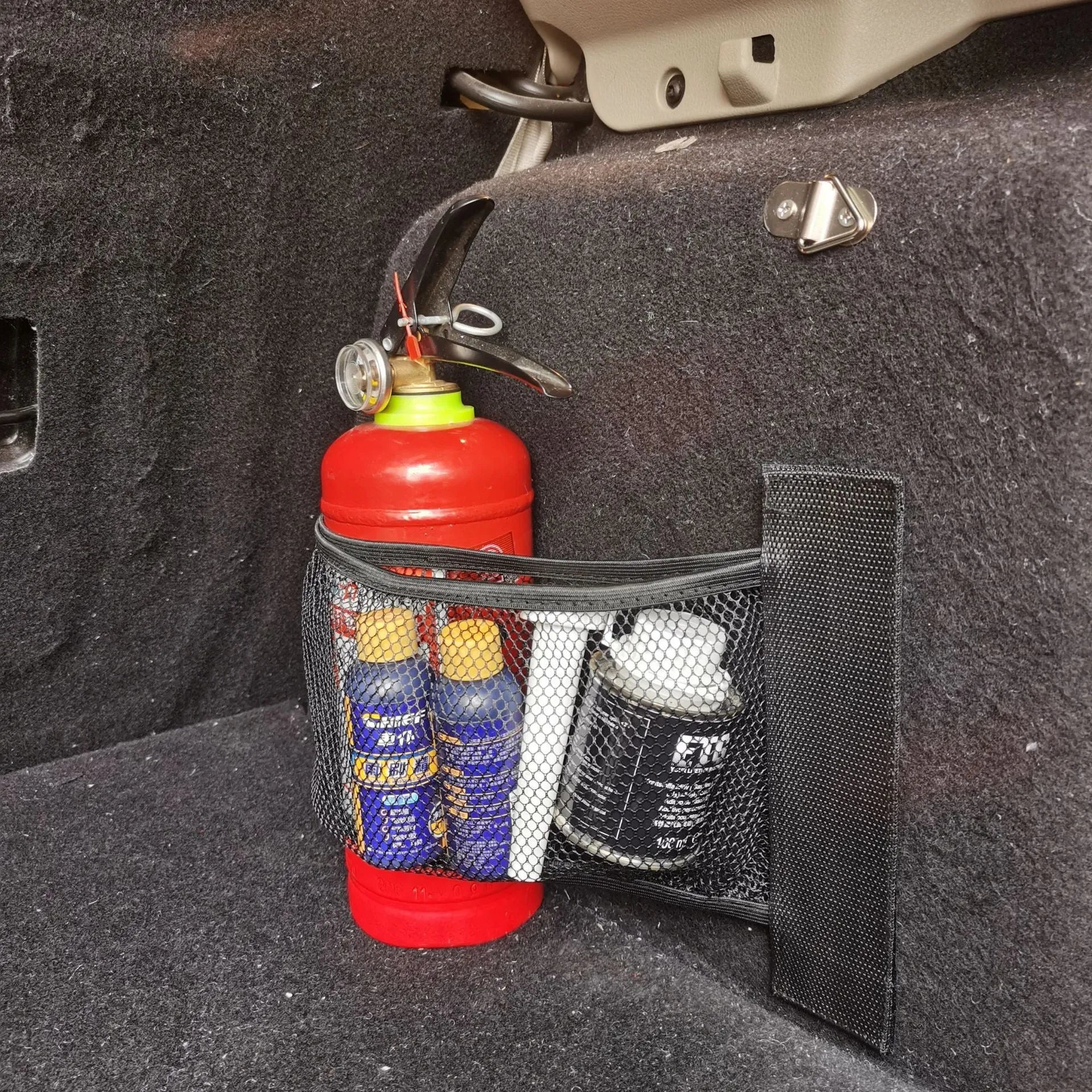 Durable polyester elastic storage net for a car boot, shown in 20x45cm size.