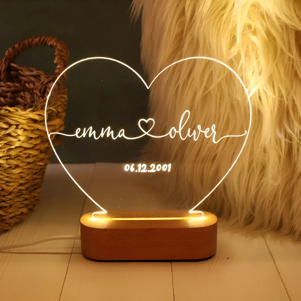 Custom acrylic LED night light displaying personalised names and date text