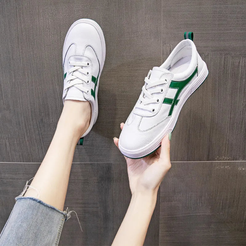 Women's leather Korean style sneakers with elastic band and round toe in black and white options