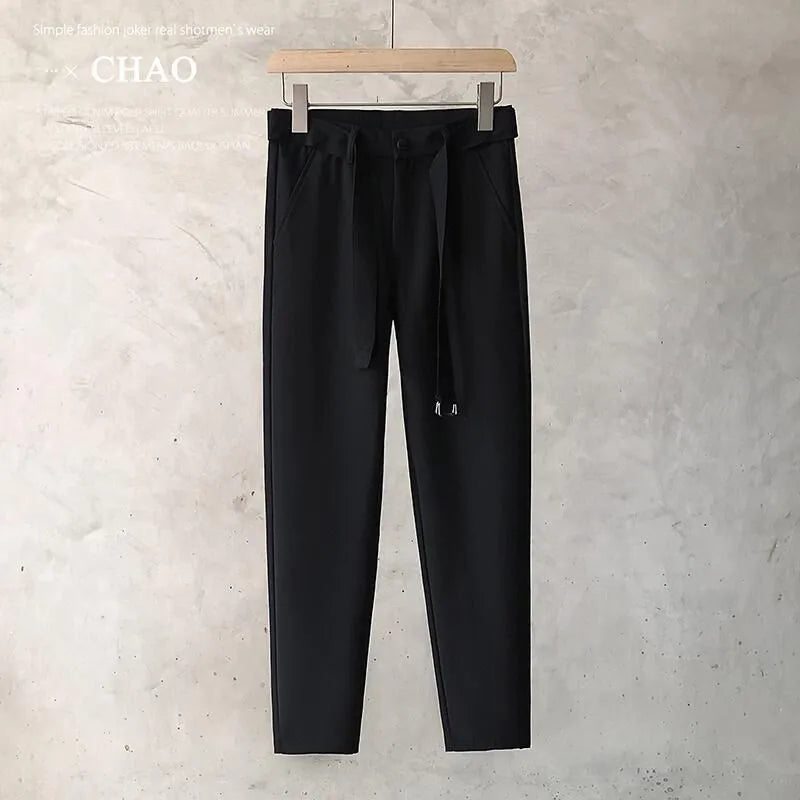 Boys slim straight wool trousers with tapered cut in black, white, dark grey, or light grey