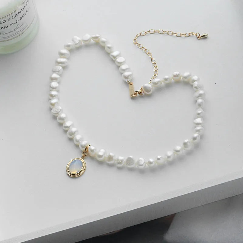Geometric silver pendant pearl necklace with irregular pearls on adjustable silver chain