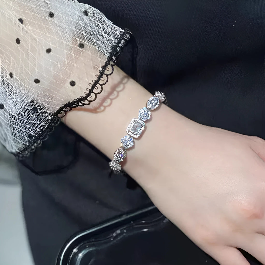 Women's geometric zircon bracelet with silver and white gold plating.