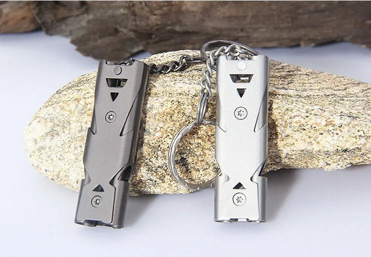 Metal keychain whistle with keychain ring in black and silver colour options