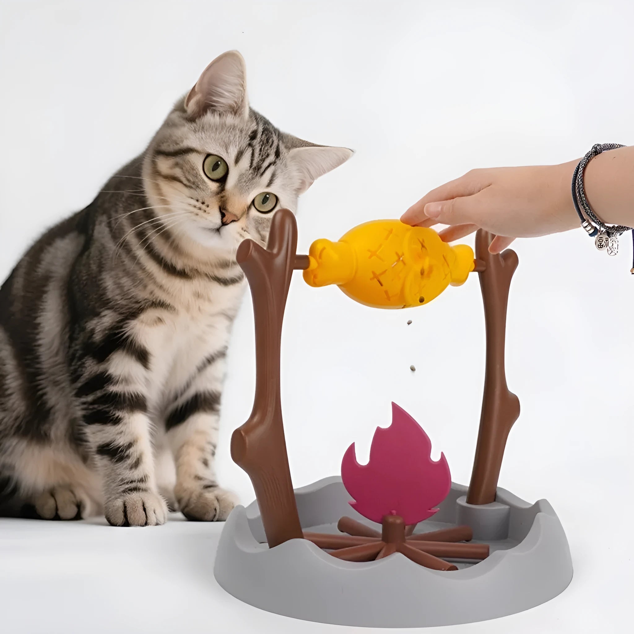 Barbecue-themed tumbling cat food feeder toy measuring 30cm with food dispensing function
