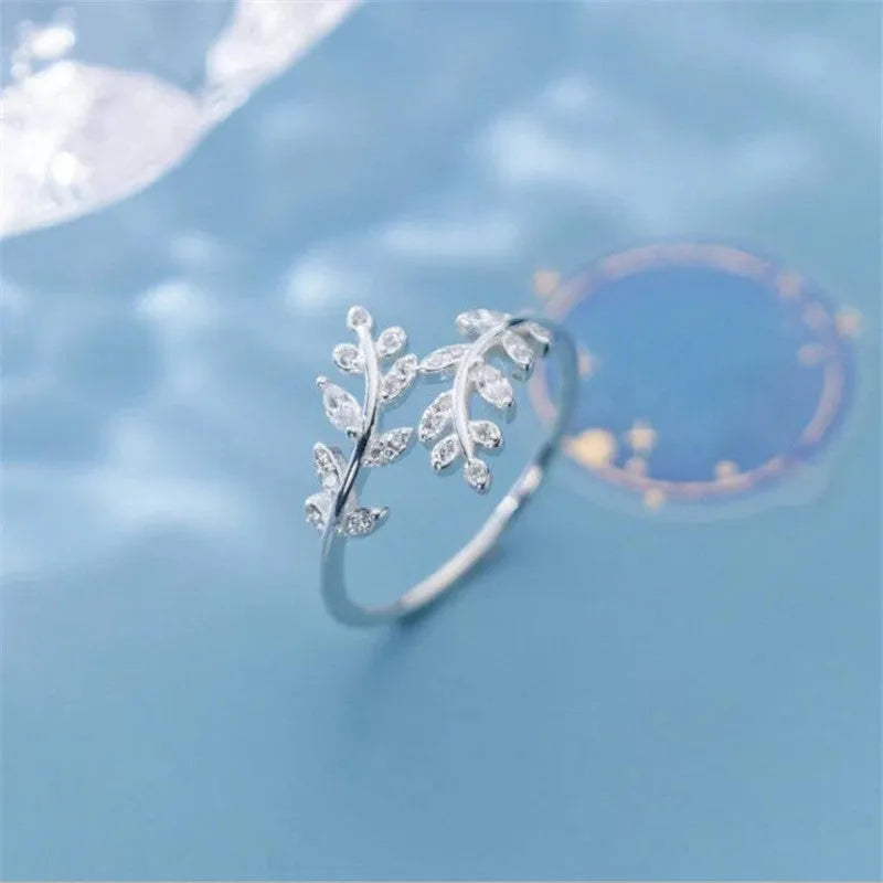 Women's copper leaf ring with geometric design in gold or silver electroplated finish