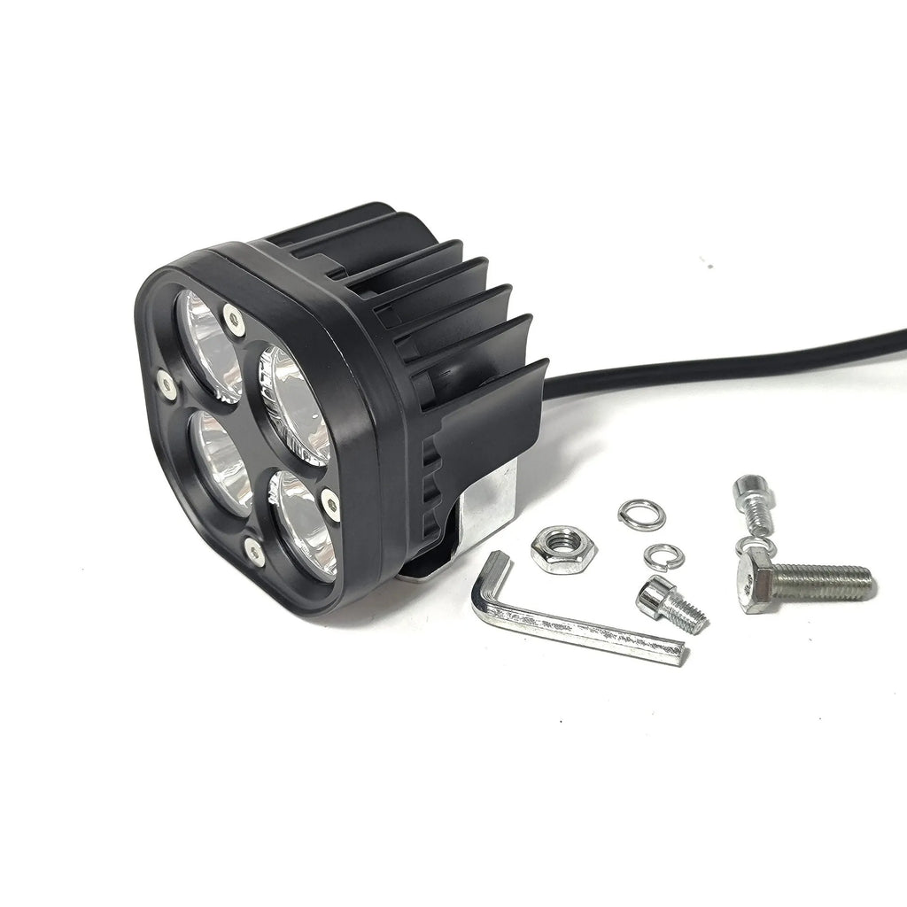 Four-leaf clover style motorcycle spotlight with aluminium base plate.