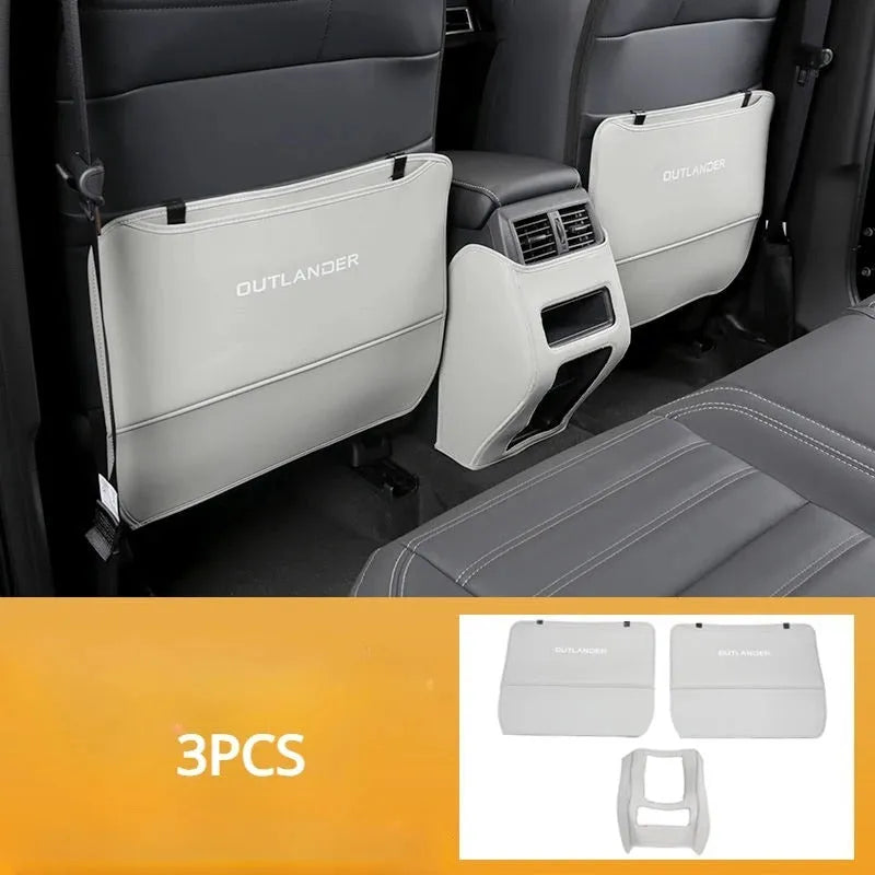 Set of three leather anti-kick pads for 2023 Mitsubishi Outlander car seats.