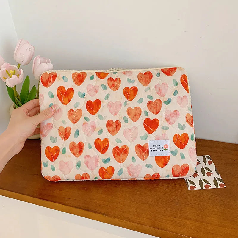 Women's floral print laptop bag in cloth material with anti-shock padding