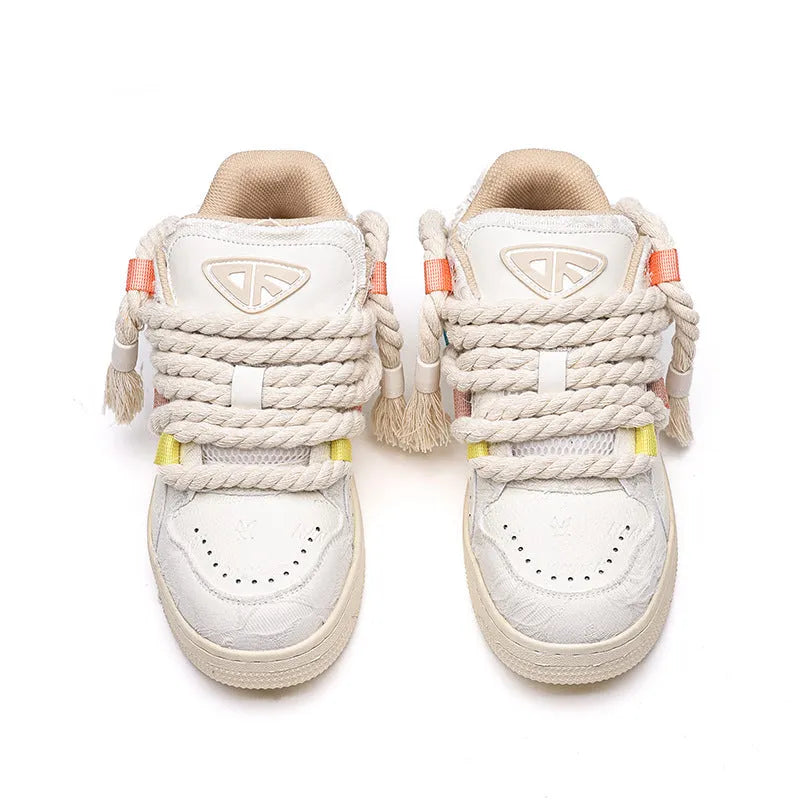 Milky white retro skateboard shoes with low-top lace-up design and platform sole