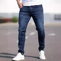 Men's dark blue slim fit jeans with skinny leg design and street fashion style