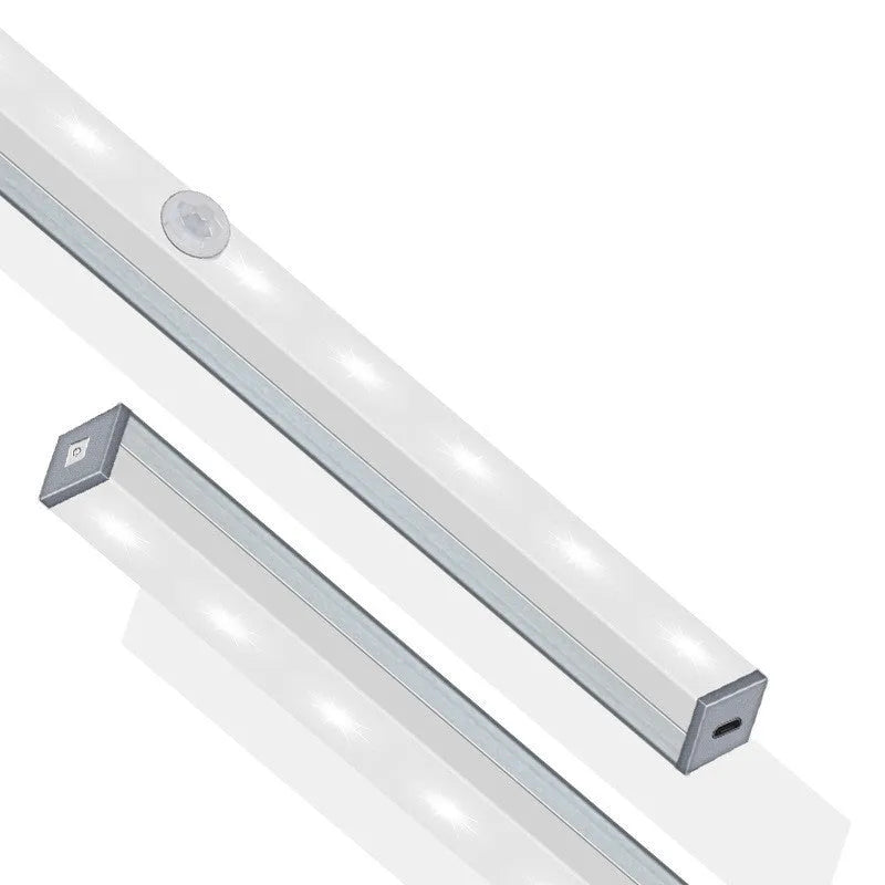 Silver aluminium USB rechargeable LED strip light with magnetic back for wardrobes.
