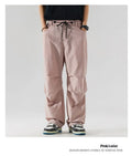 Men's thin ice silk nylon trousers in a loose straight leg fit, shown in apricot colour