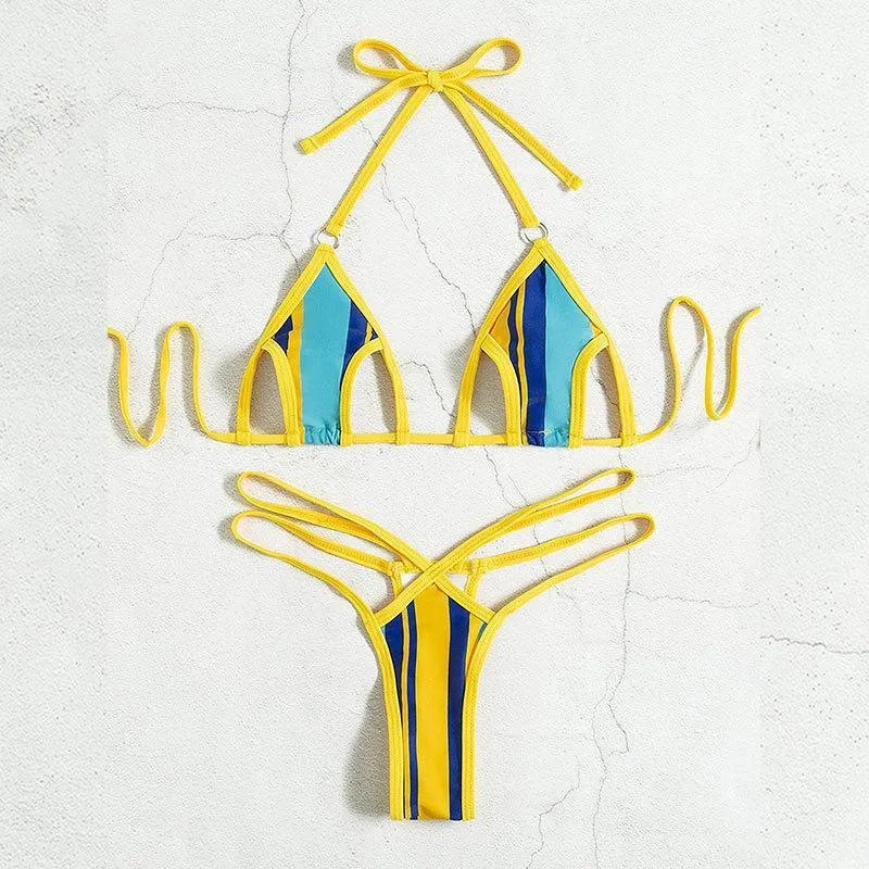 Yellow women's split swimsuit with neck-hanging style, backless hollow design, and high-waist shorts.