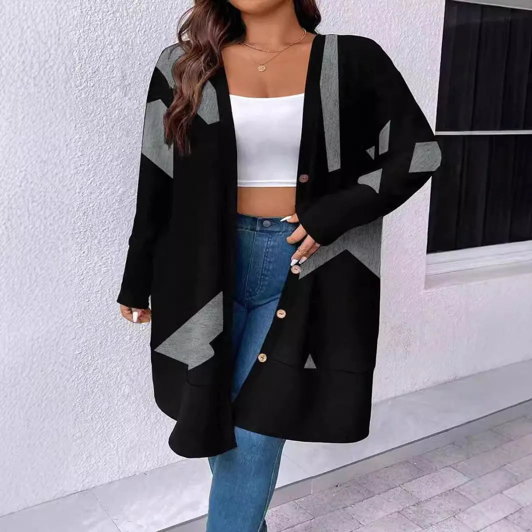 Black loose fit knit cardigan coat with button front on a hanger.