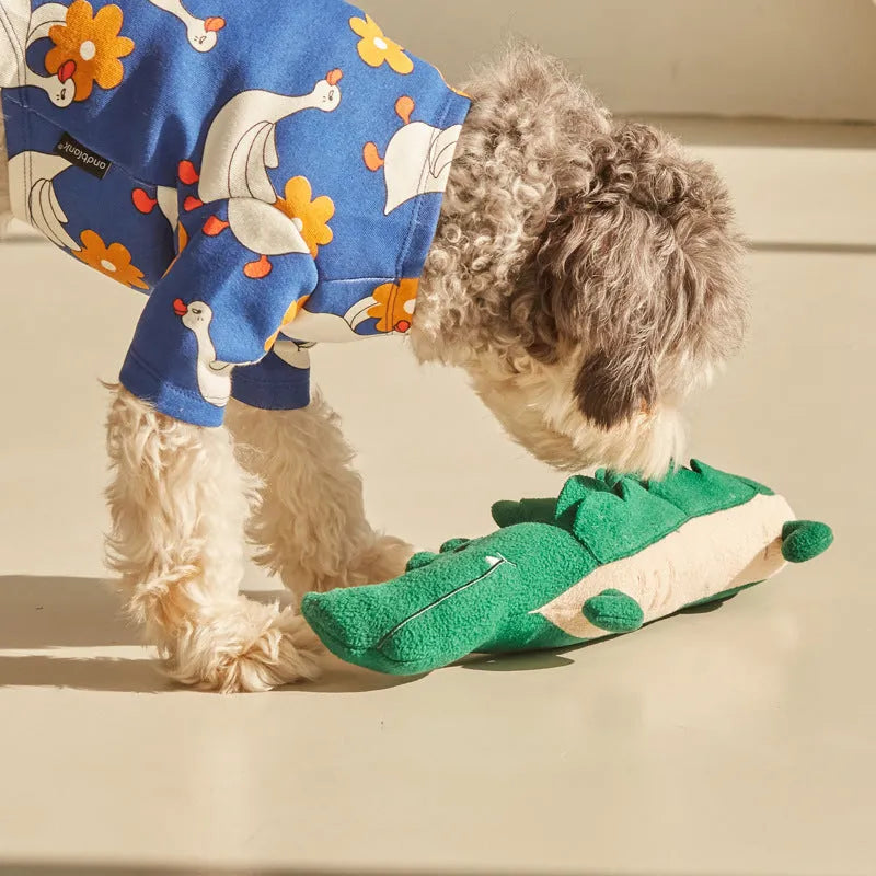Green plush toy dog on a white background showing its 35x18cm size
