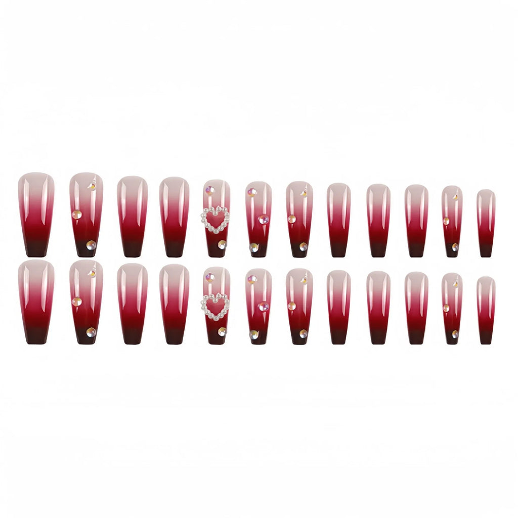 Wine red gradient false nail tips with plaid pattern and pearl heart accents in a long ballet shape.