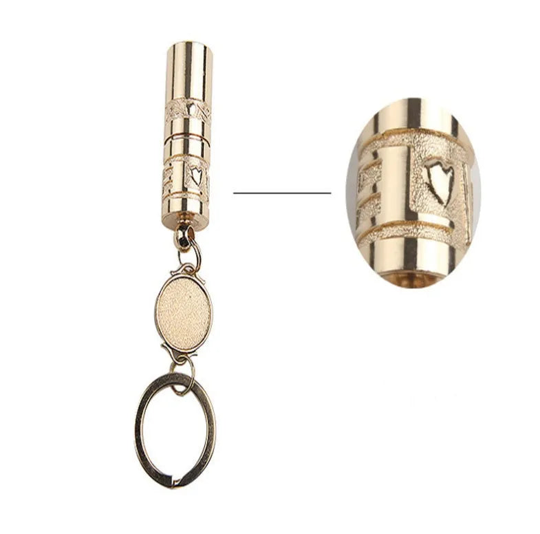 Gold zinc alloy waterproof LED keychain flashlight on a keyring.