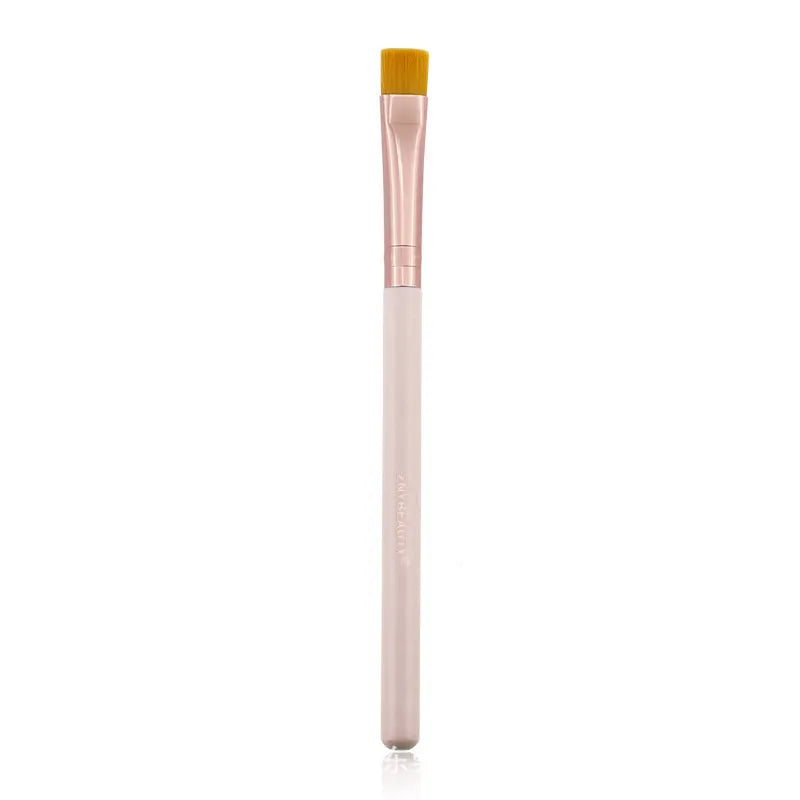26 pink makeup brushes with wooden handles arranged in a PU carry case.