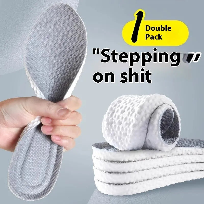 A pair of grey breathable PU sports insoles that can be cut to size on a white background